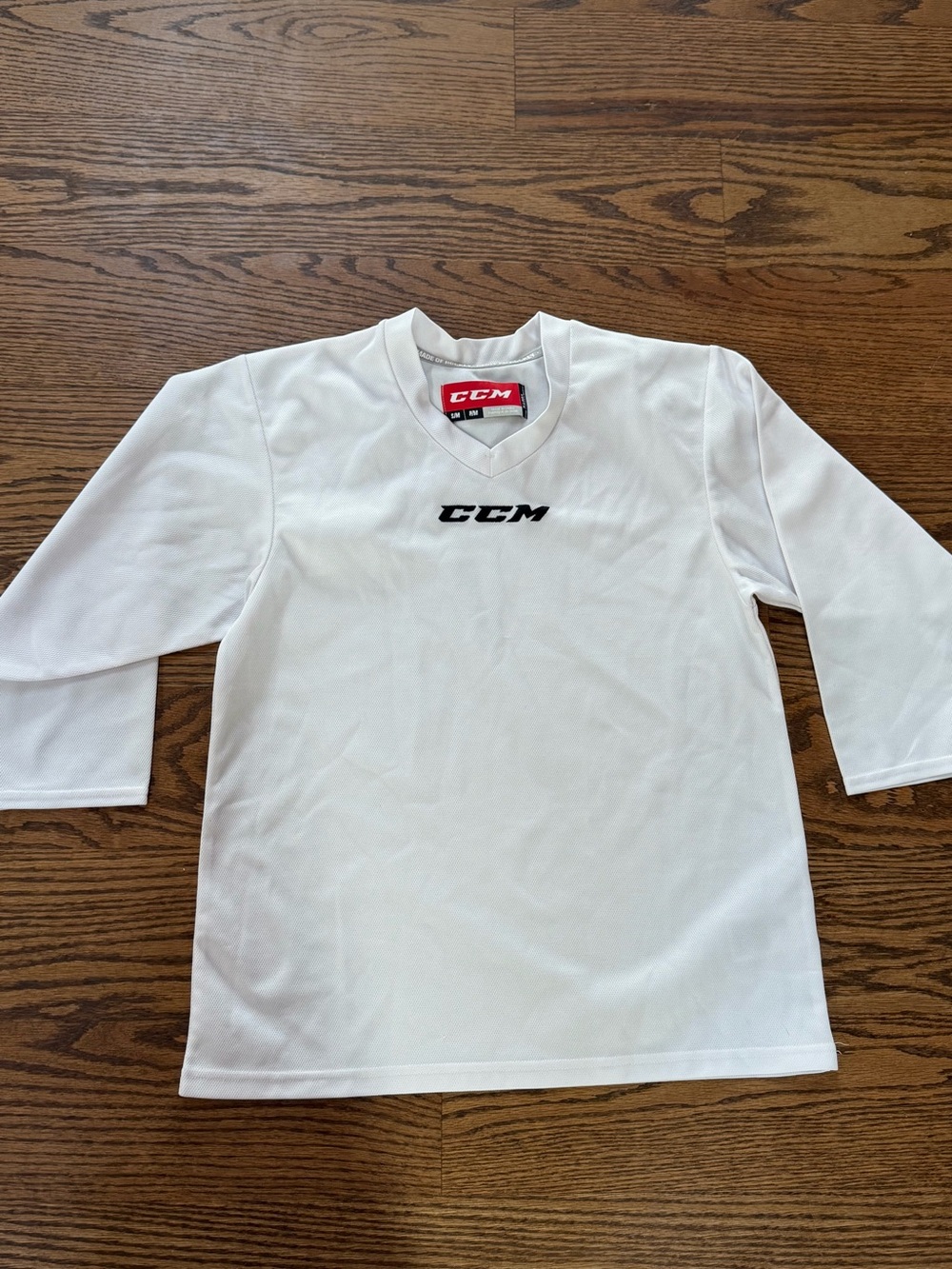 Youth small CCM white hockey jersey